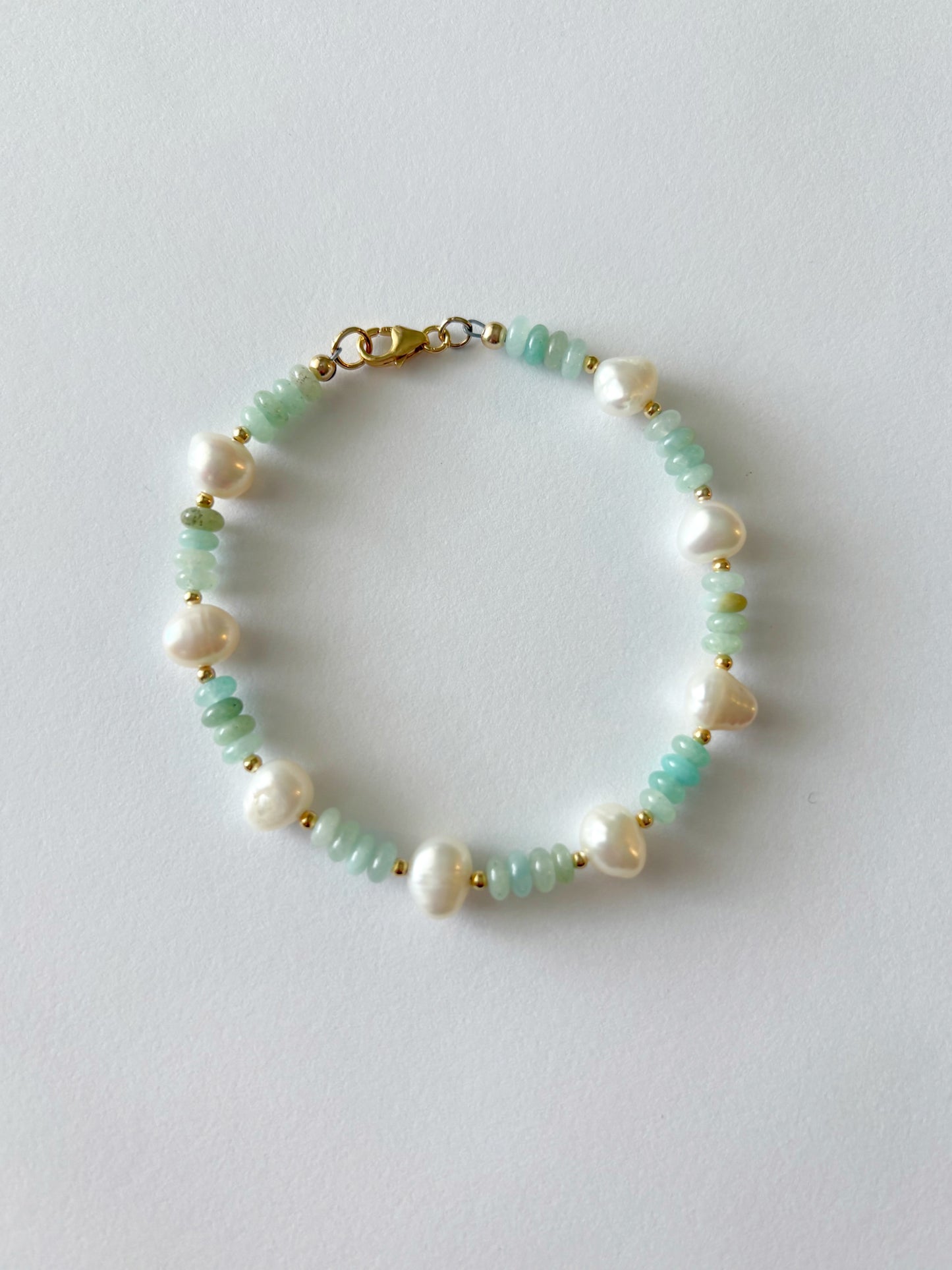 Amazonite and Pearl Bracelet with light green amazonite beads, white pearls, and gold spacers