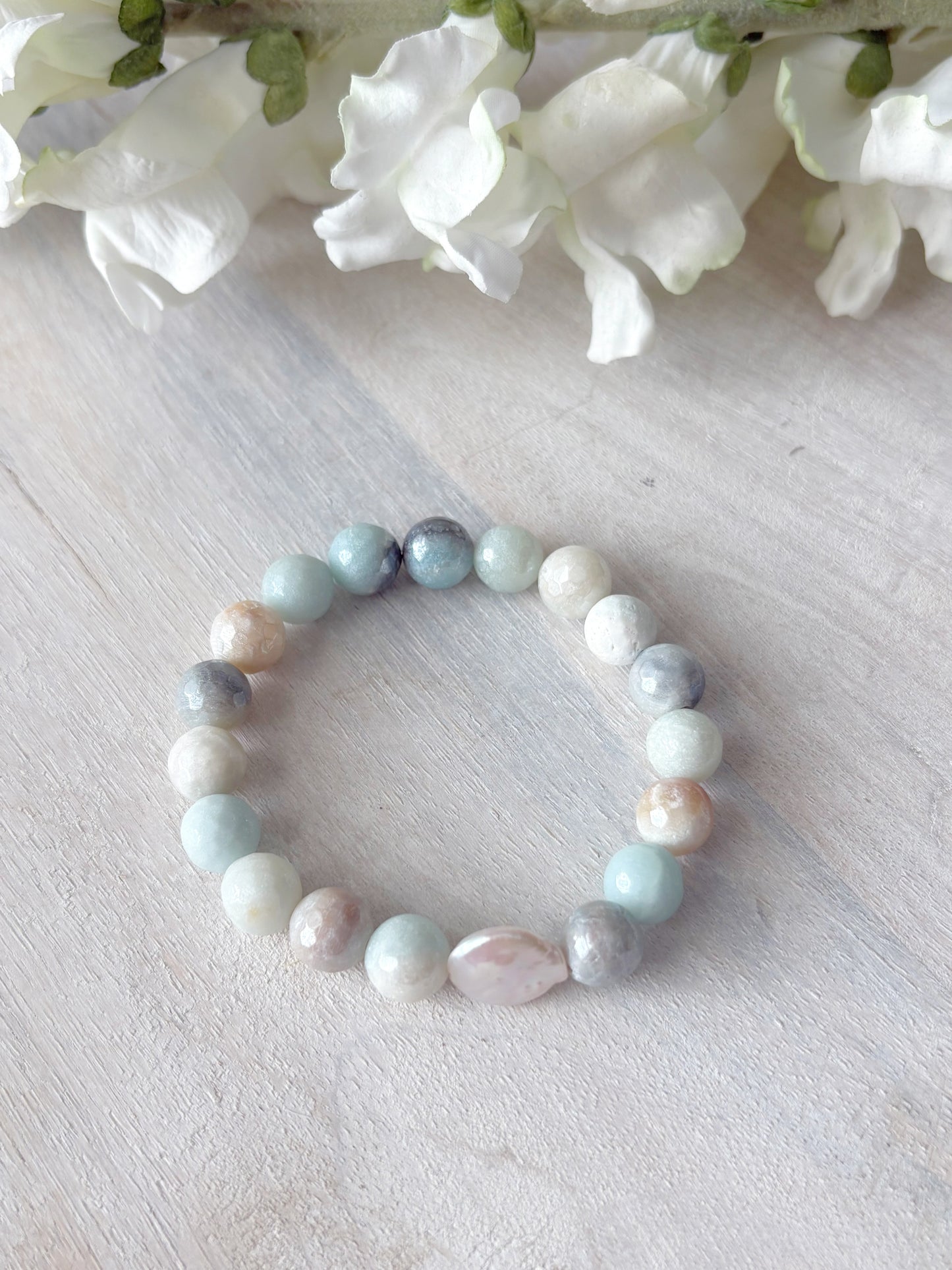 Mystic Amazonite and Pearl Bracelet with round amazonite beads and a single pink pearl