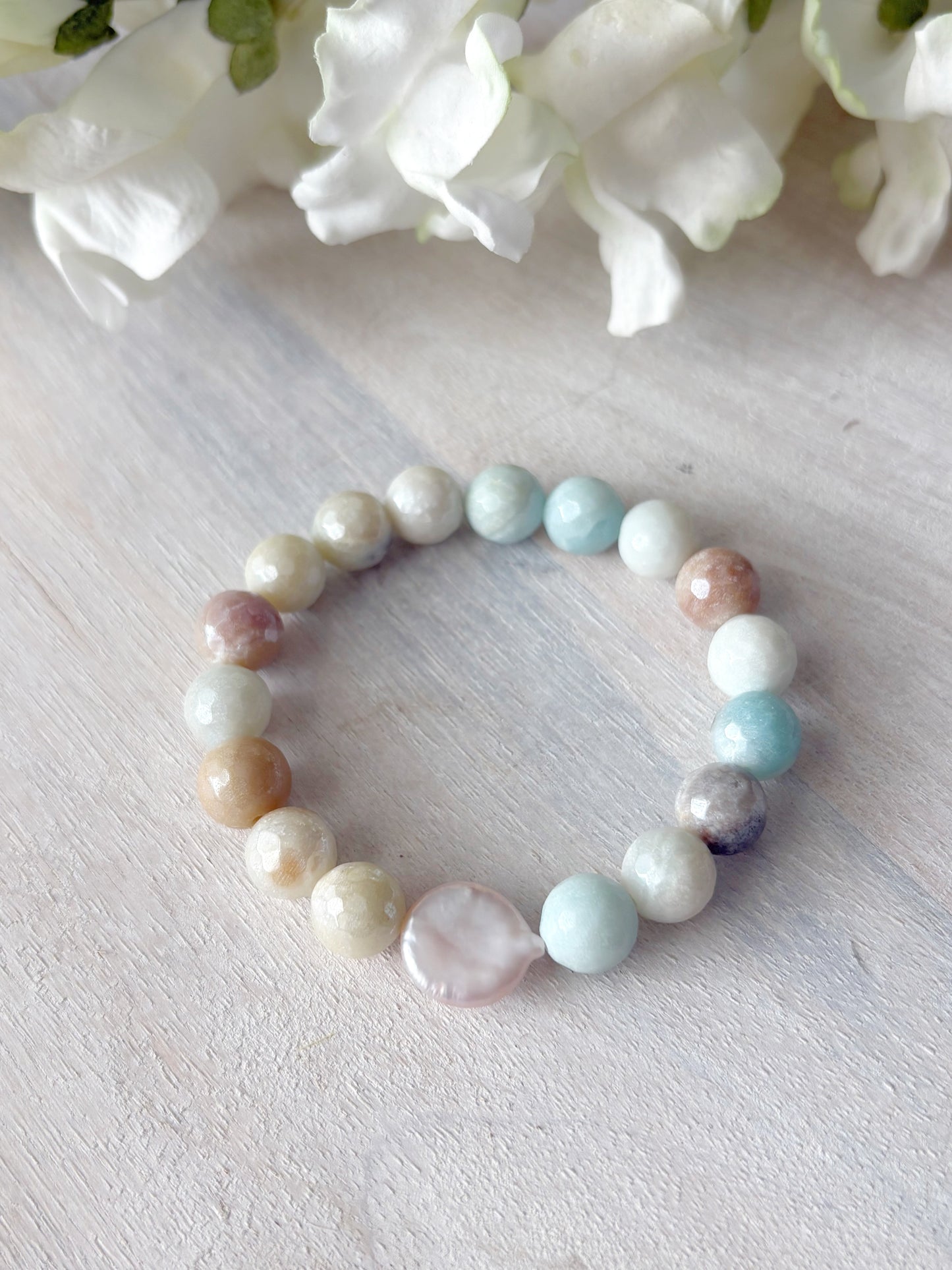 Mystic Amazonite and Pearl Bracelet with round amazonite beads and a flat pink pearl