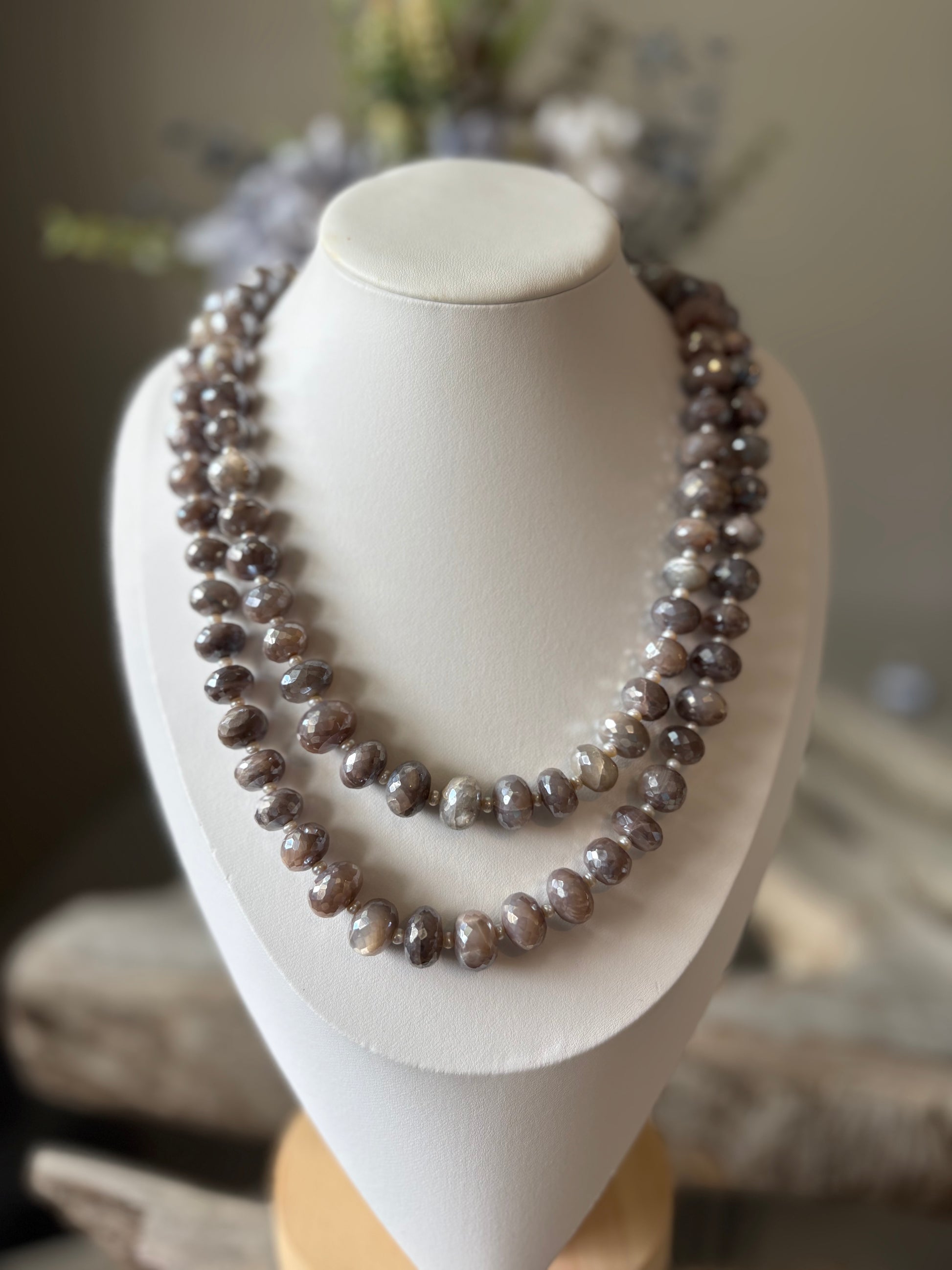 Chocolate Moonstone and Pearl Necklace on a white display bust