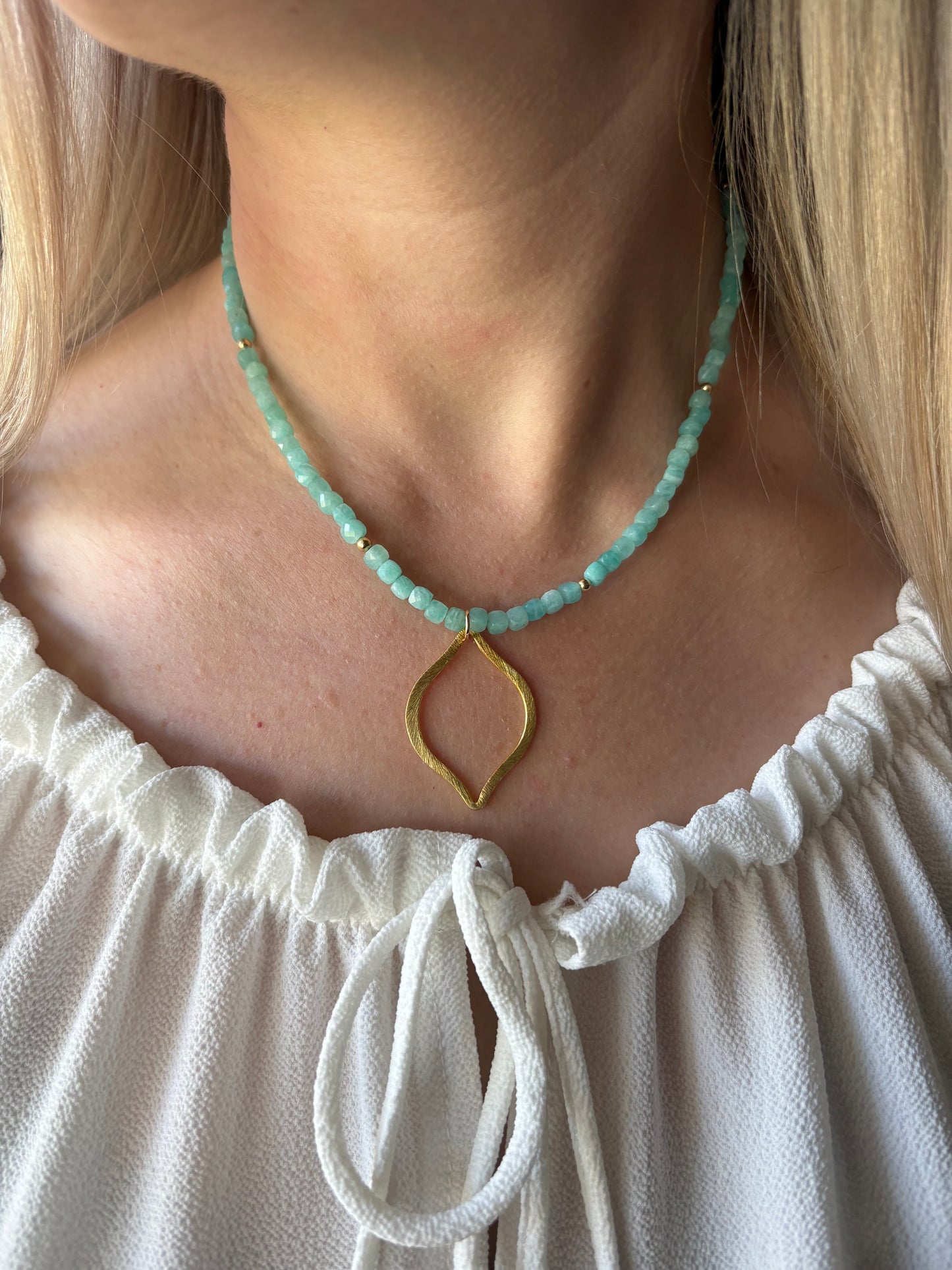 Amazonite Gold Teardrop Necklace with faceted amazonite beads and a gold teardrop pendant