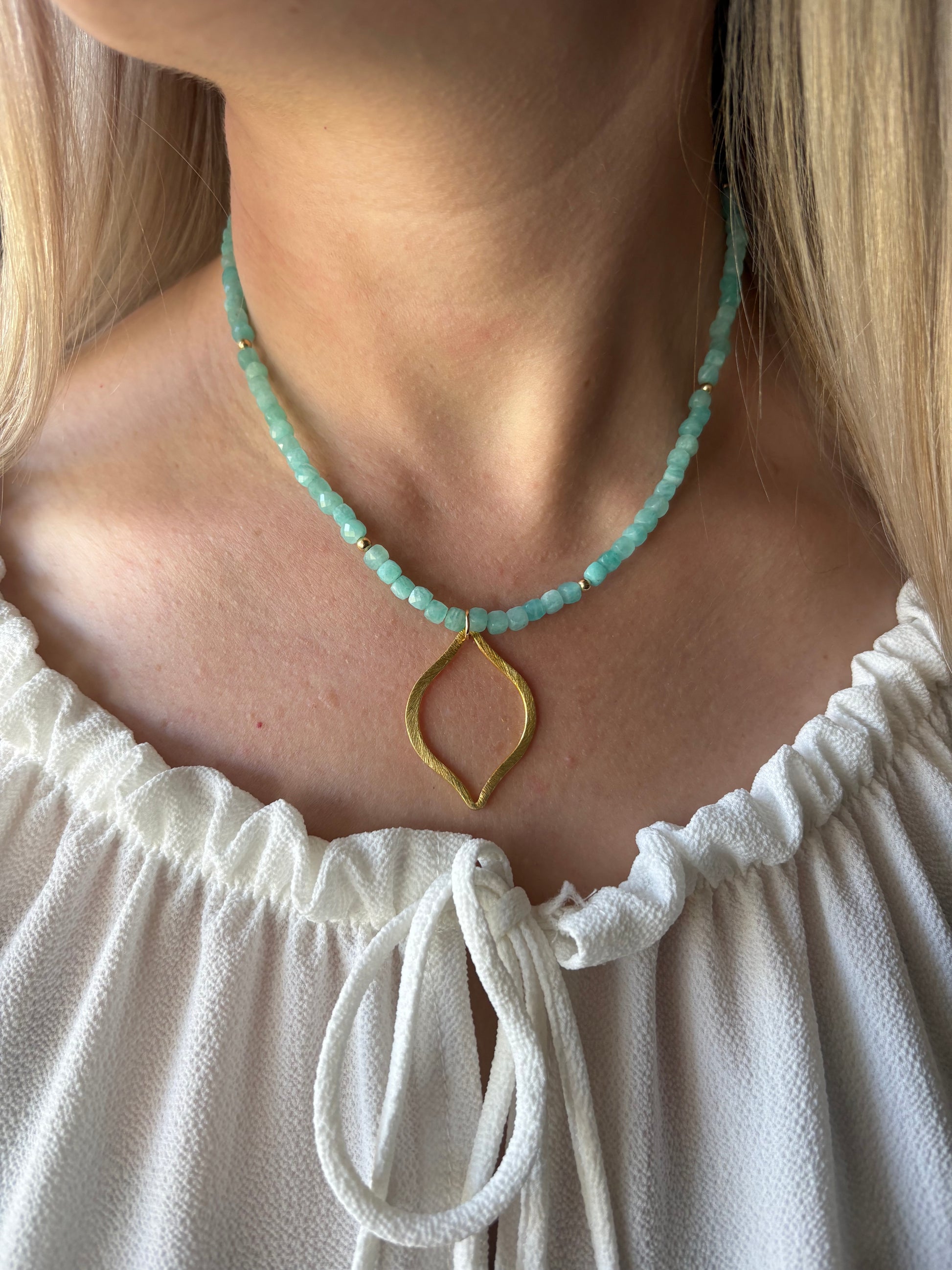 Amazonite Gold Teardrop Necklace with faceted amazonite beads and a gold teardrop pendant