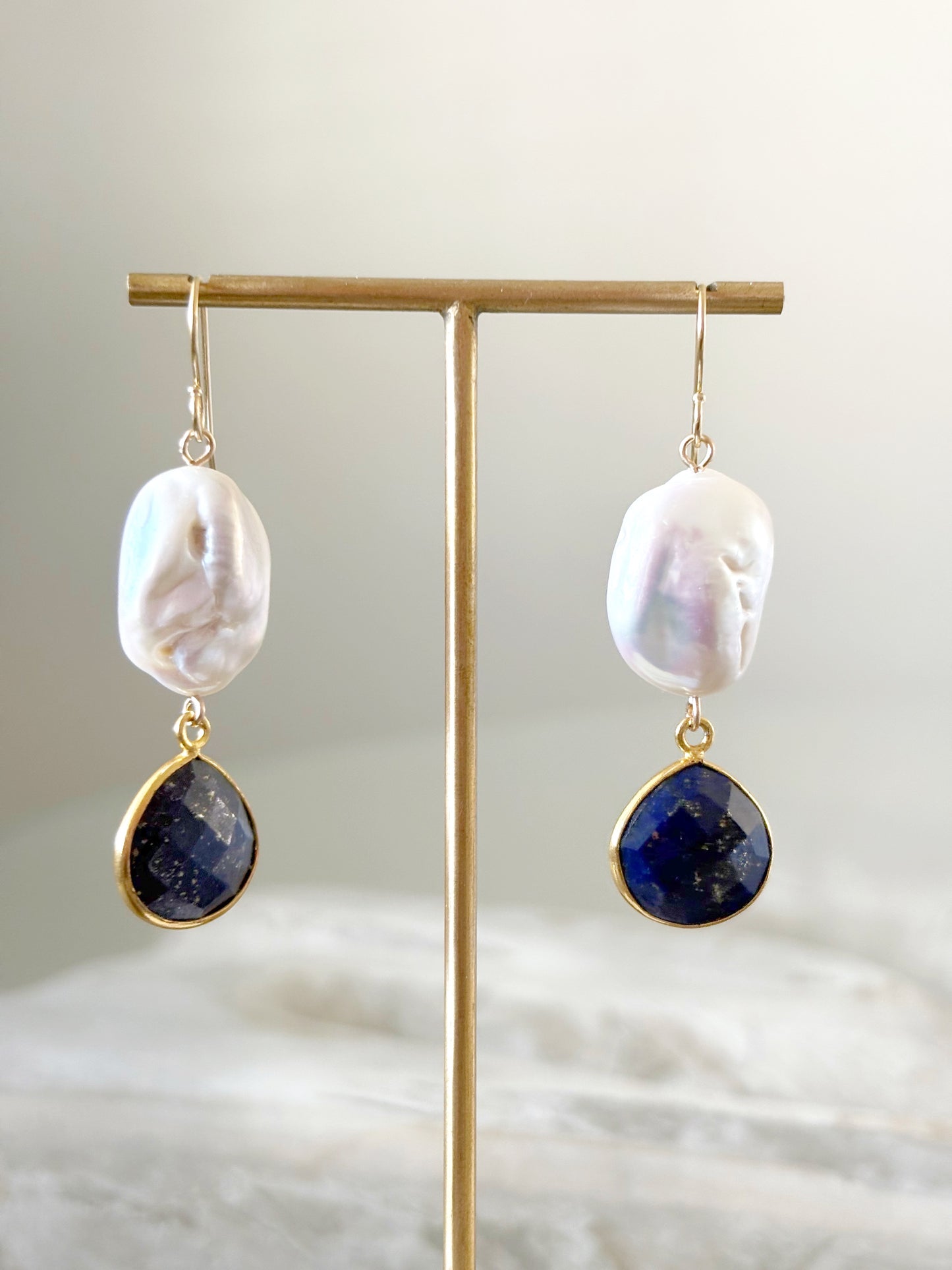 Large Pearl and Lapis Earrings on a gold stand