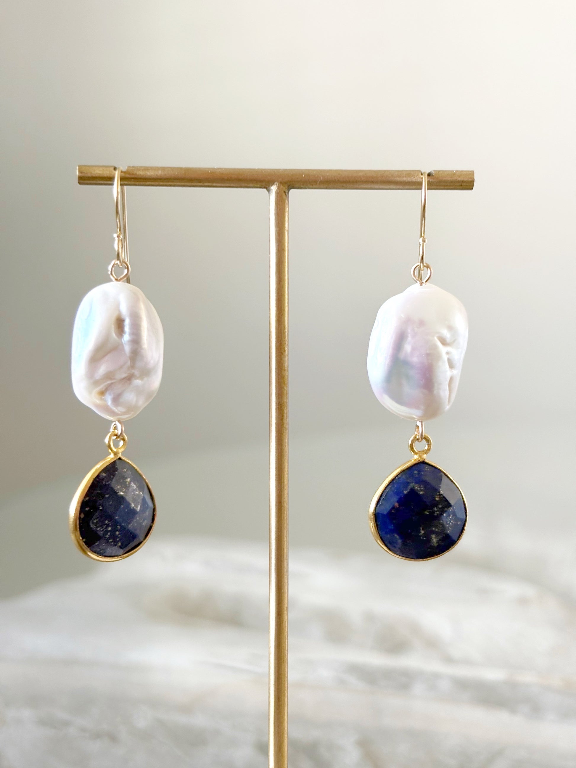 Large Pearl and Lapis Earrings on a gold stand