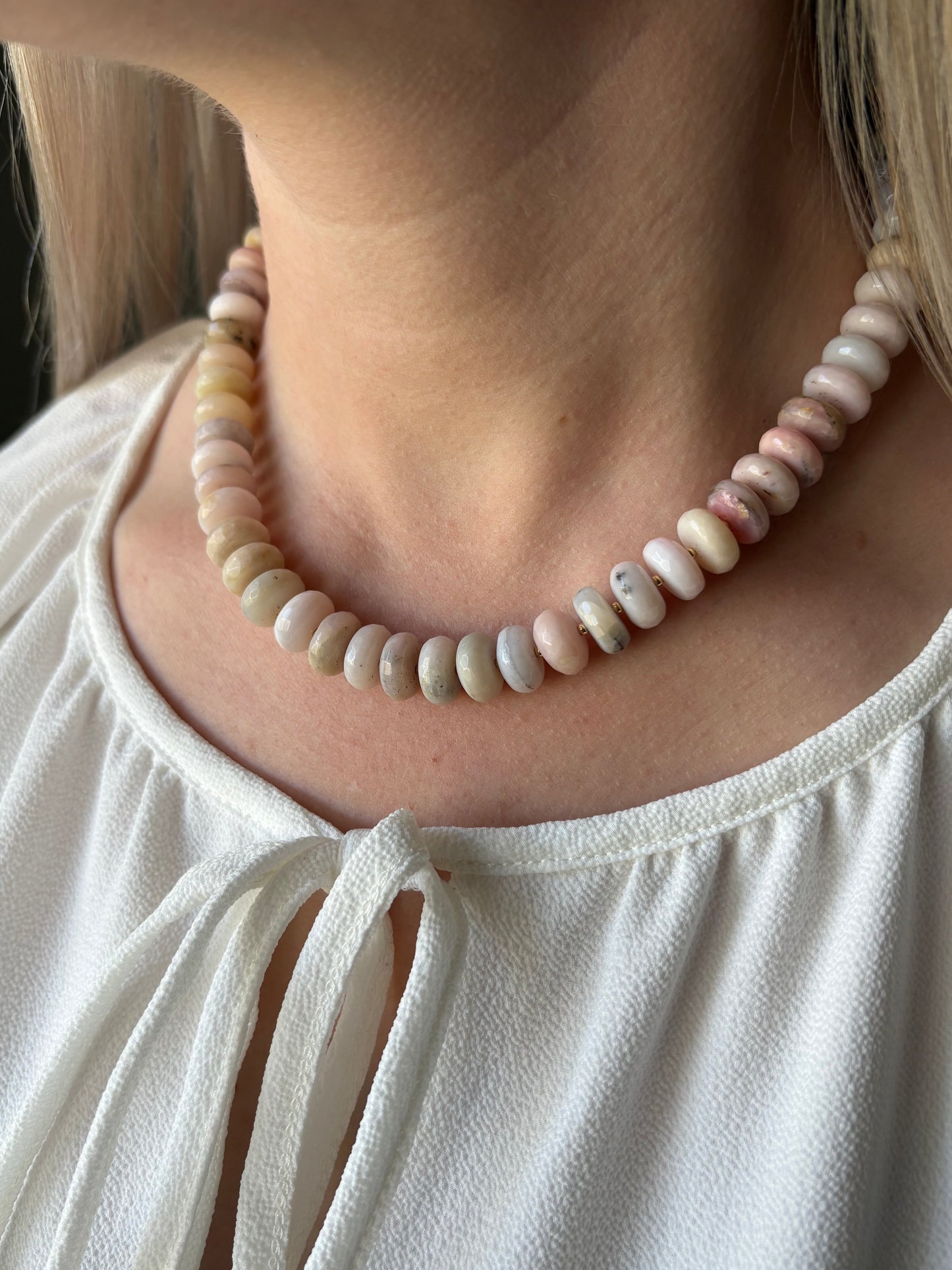 Chunky Pink Opal Necklace on a person wearing a white blouse