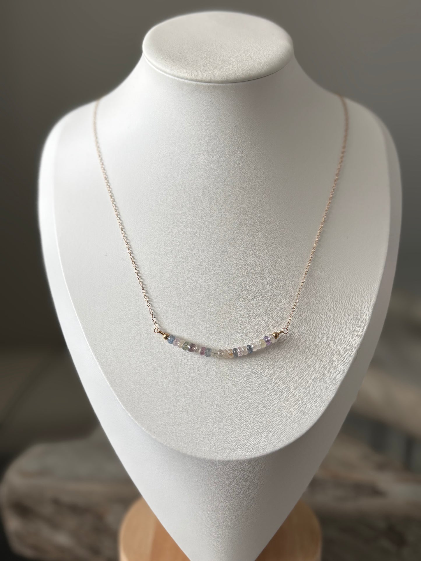 Multi Stone Chain Necklace on a white bust