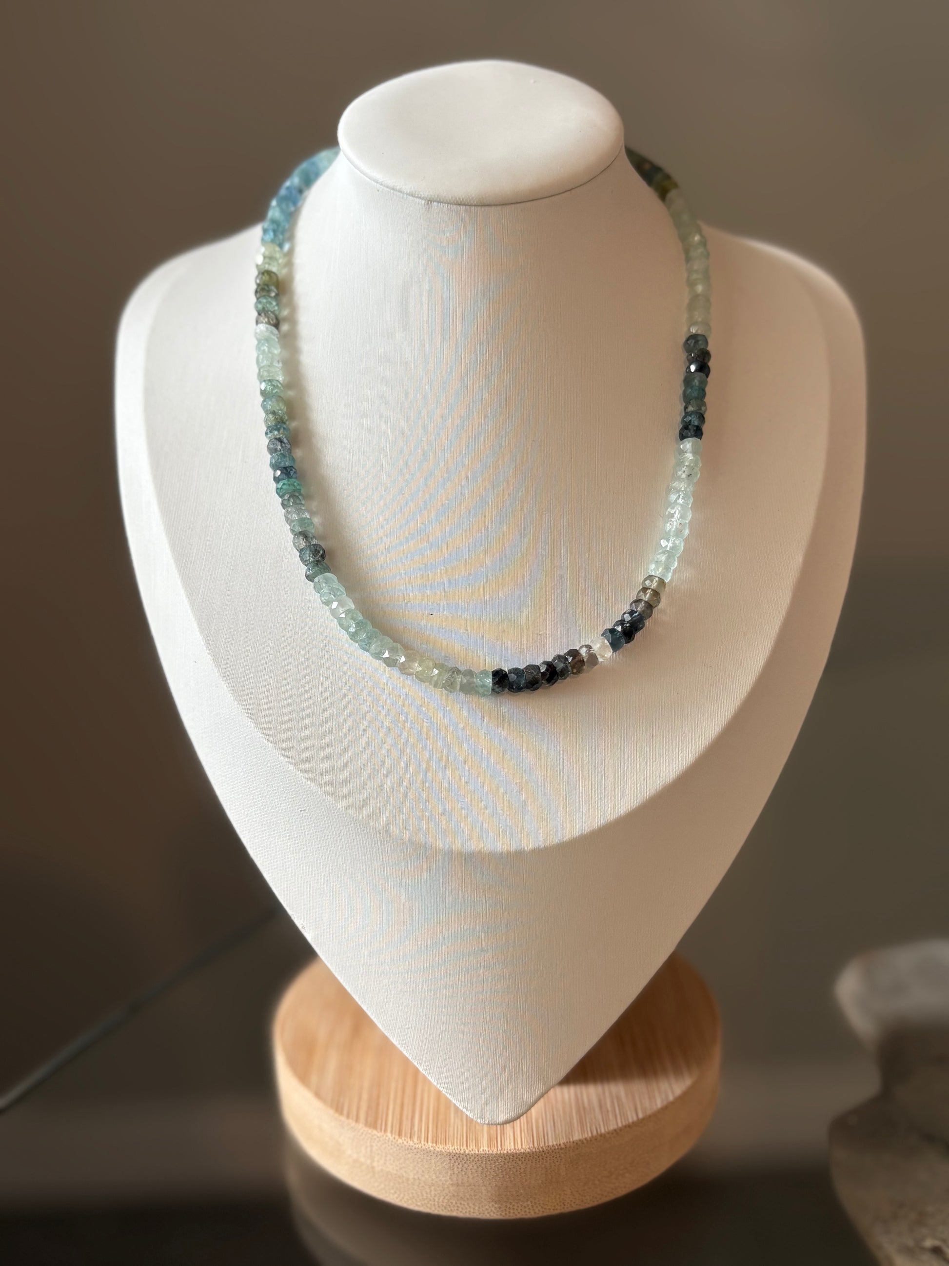 Moss Aquamarine Necklace 14 inch on a white bust